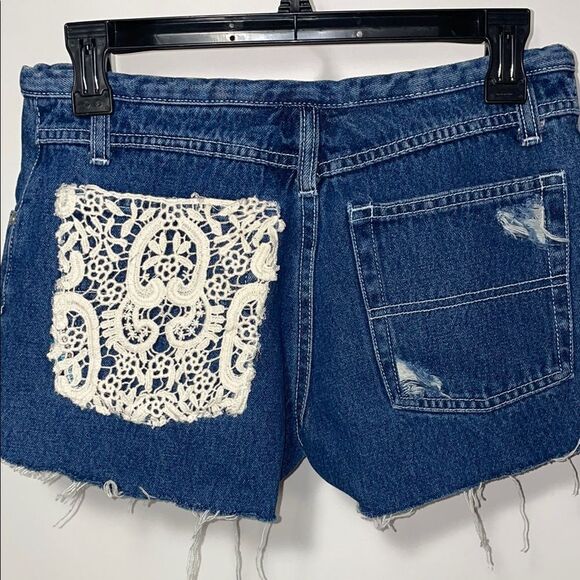 Nick and Lara’s Distressed Denim Shorts - Picture 6 of 8